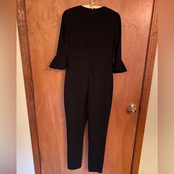 Black jumpsuit with bell sleeves size M - Picture 1 of 8